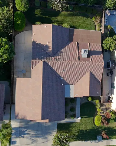 an aerial view of a house having yard