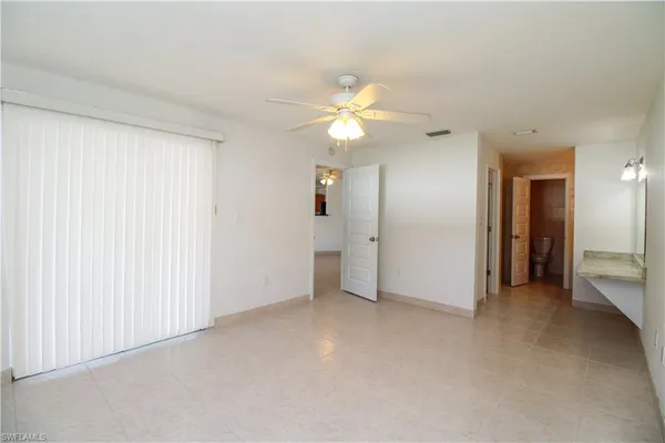 a view of a bathroom from a hallway