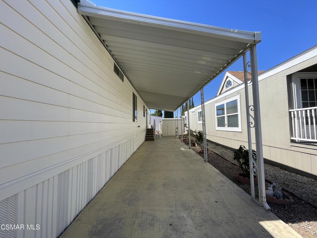 6480 Katherine Road, Unit 79 Simi Valley, CA 93063 - Photo 20 of 40 a view of a house with a backyard