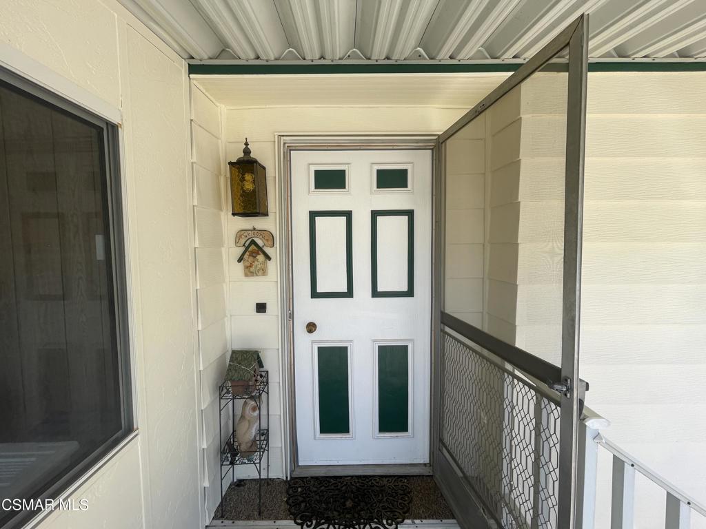 6480 Katherine Road, Unit 79 Simi Valley, CA 93063 - Photo 3 of 40 a view of a door of the house