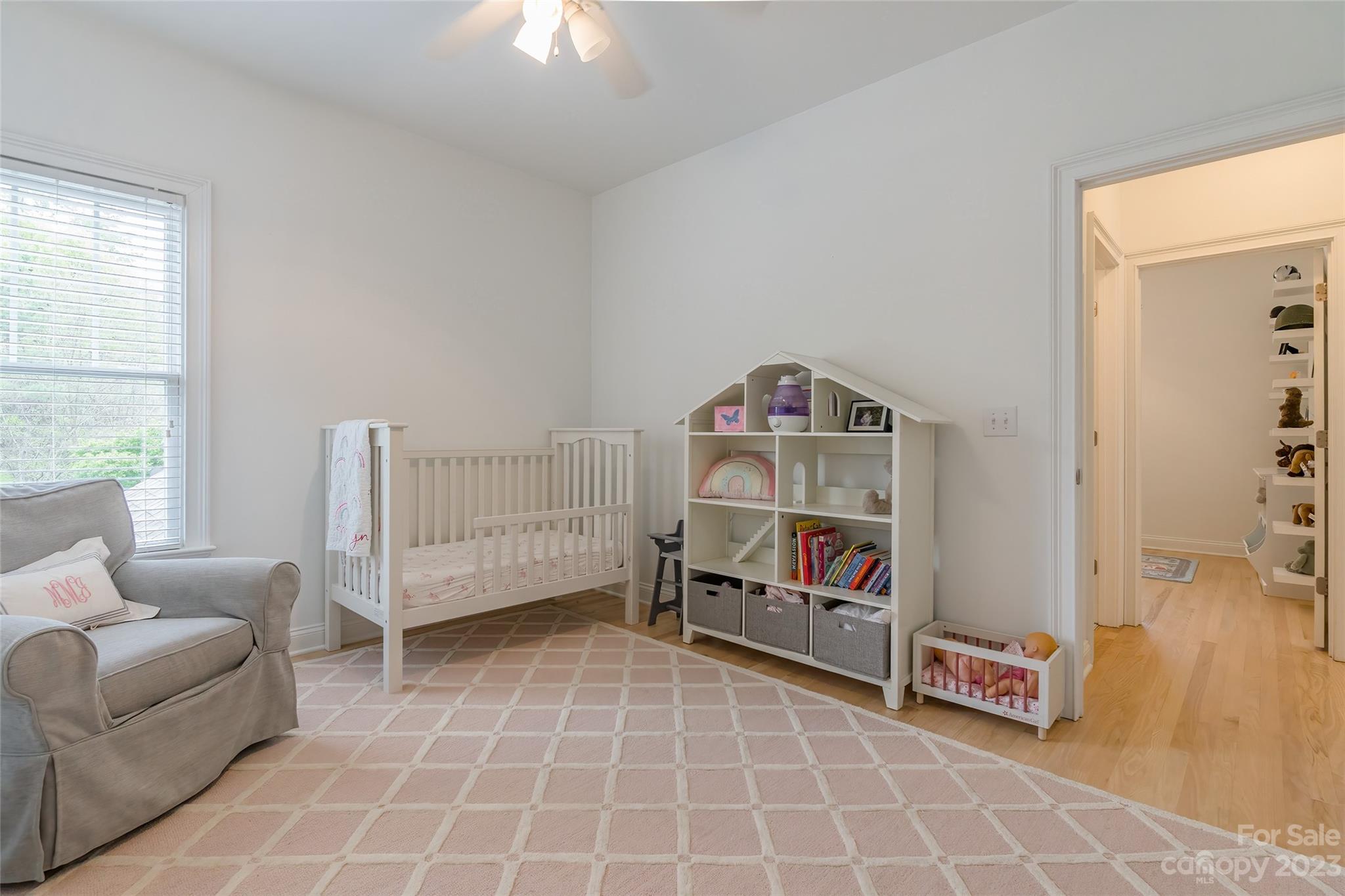 1744 Catherine Lothie Way Fort Mill, SC 29708 - Photo 29 of 44 a livingroom with furniture and a book shelf