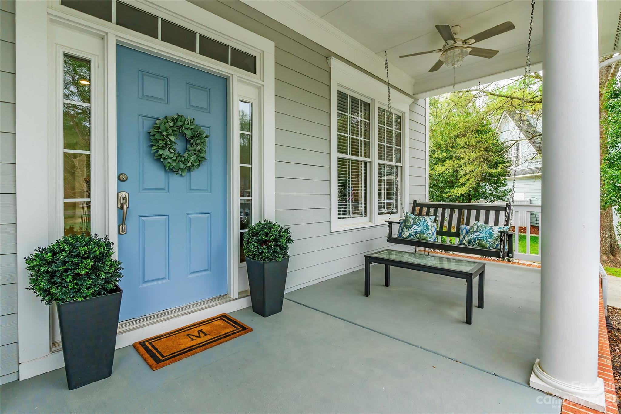 1744 Catherine Lothie Way Fort Mill, SC 29708 - Photo 3 of 44 a building outdoor space with patio furniture and potted plants
