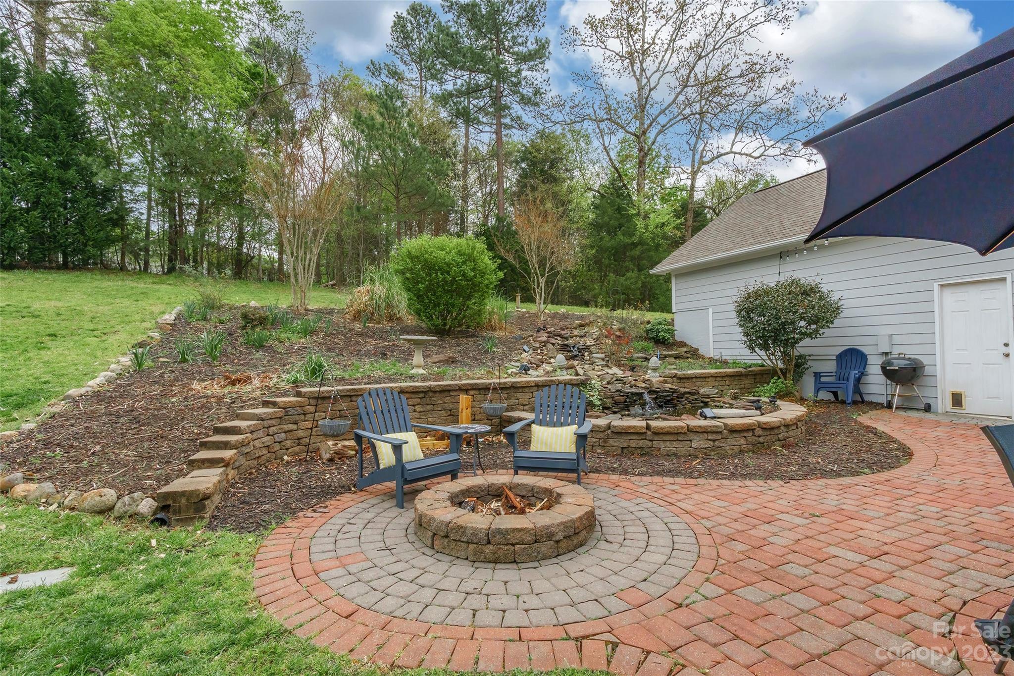 1744 Catherine Lothie Way Fort Mill, SC 29708 - Photo 38 of 44 a view of a house with backyard and sitting area