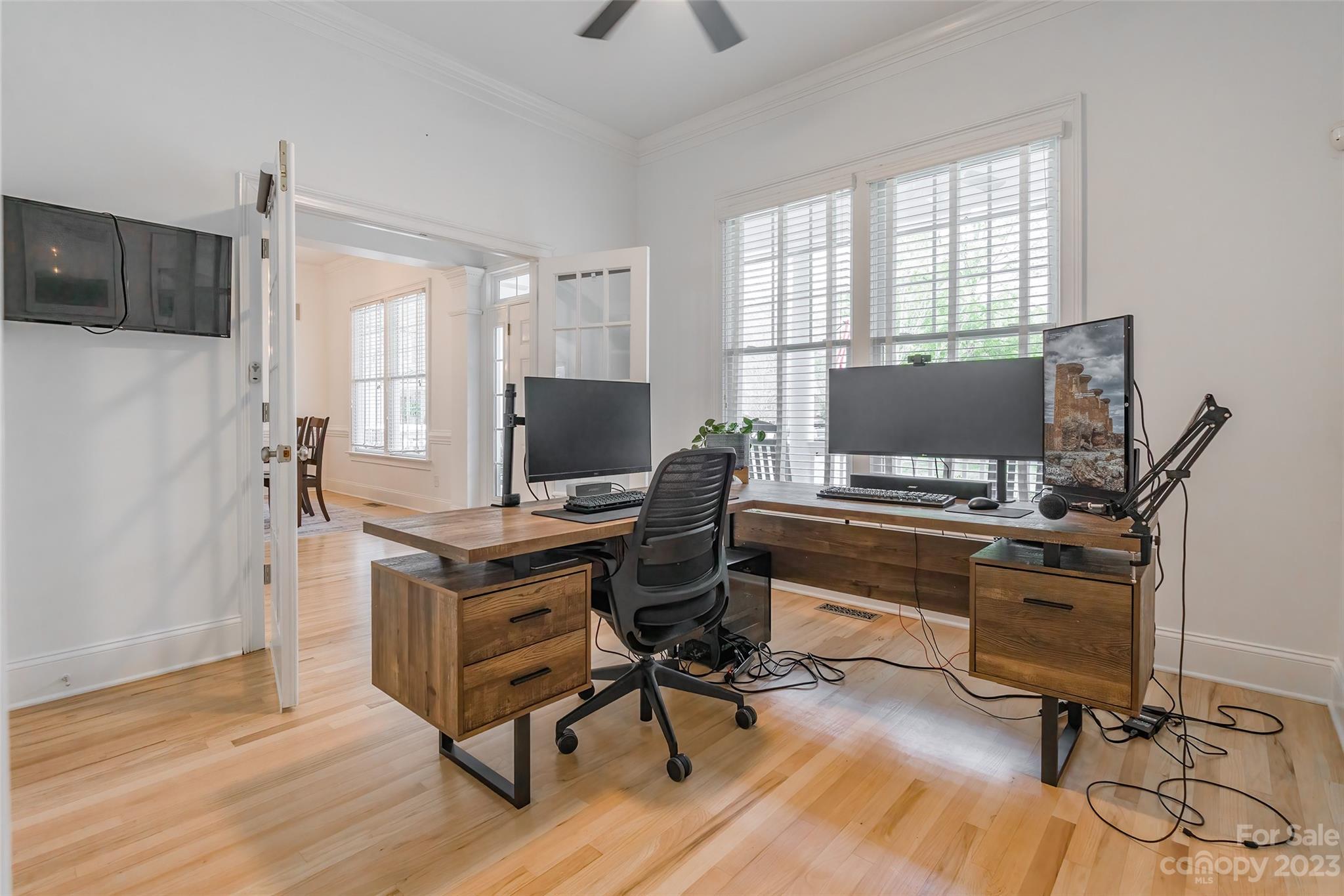 1744 Catherine Lothie Way Fort Mill, SC 29708 - Photo 7 of 44 a view of a workspace with furniture and a window