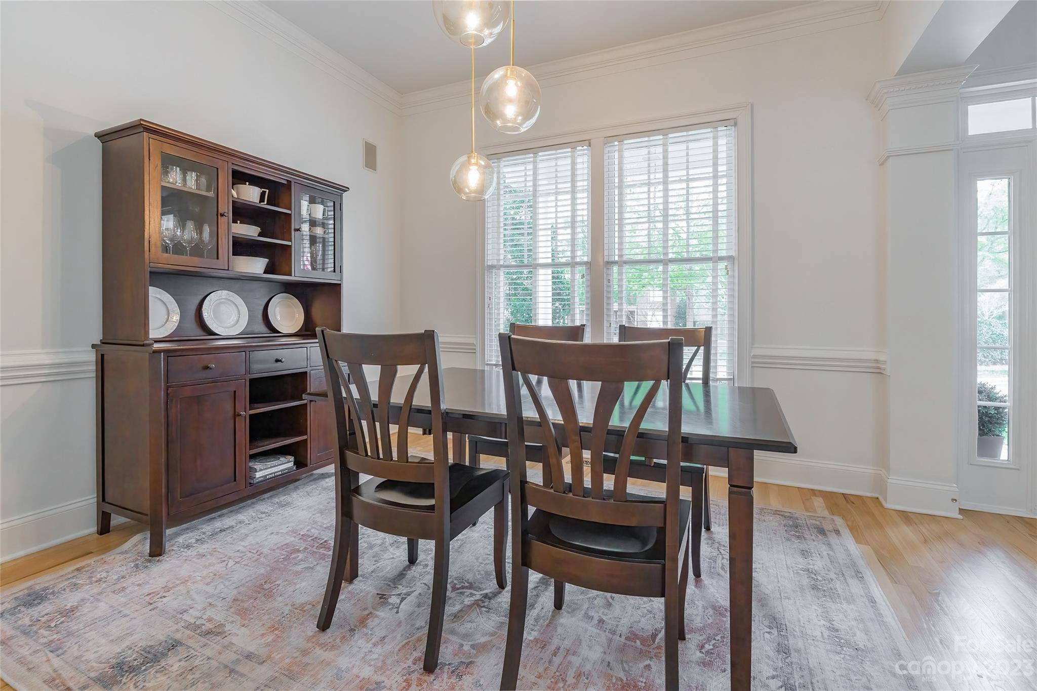 1744 Catherine Lothie Way Fort Mill, SC 29708 - Photo 9 of 44 a view of a dining room with furniture window and wooden floor