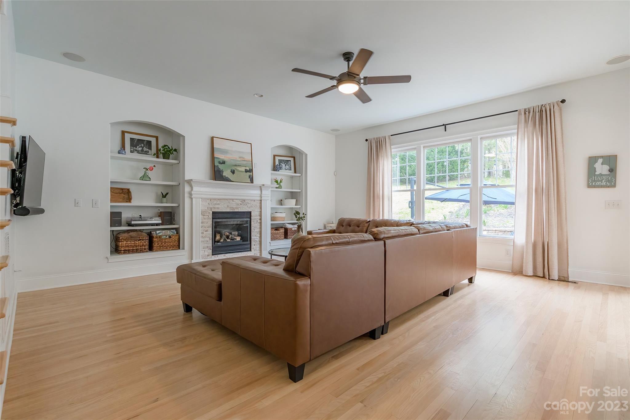 1744 Catherine Lothie Way Fort Mill, SC 29708 - Photo 10 of 44 a living room with furniture and a fireplace
