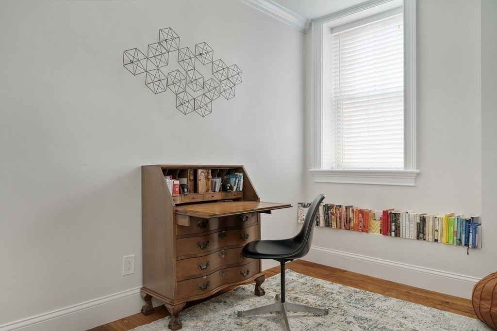 55 Addington Road, Unit 1 Brookline, MA 02445 - Photo 22 of 33 a view of a workspace with furniture and a window