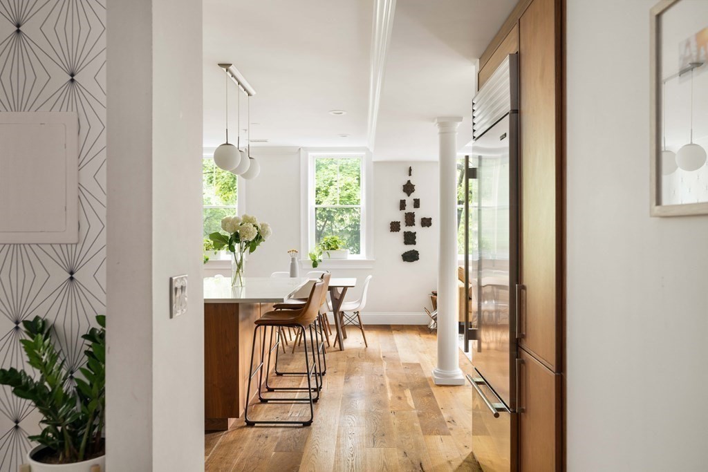 55 Addington Road, Unit 1 Brookline, MA 02445 - Photo 4 of 33 a view of a dining room with furniture window and wooden floor