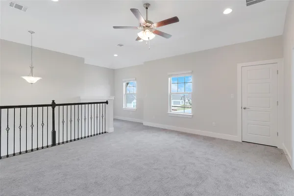 an empty room with a fireplace