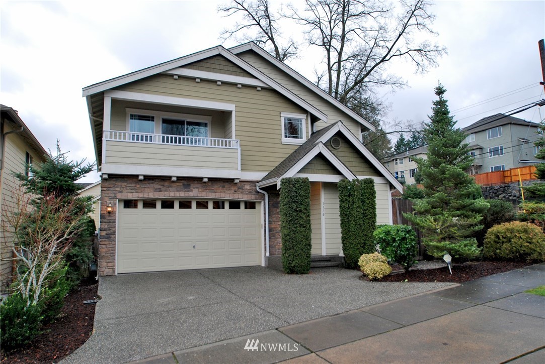 1720 235th Place Southwest Bothell, WA 98021 - Photo 1 of 1 a front view of a house with a garage