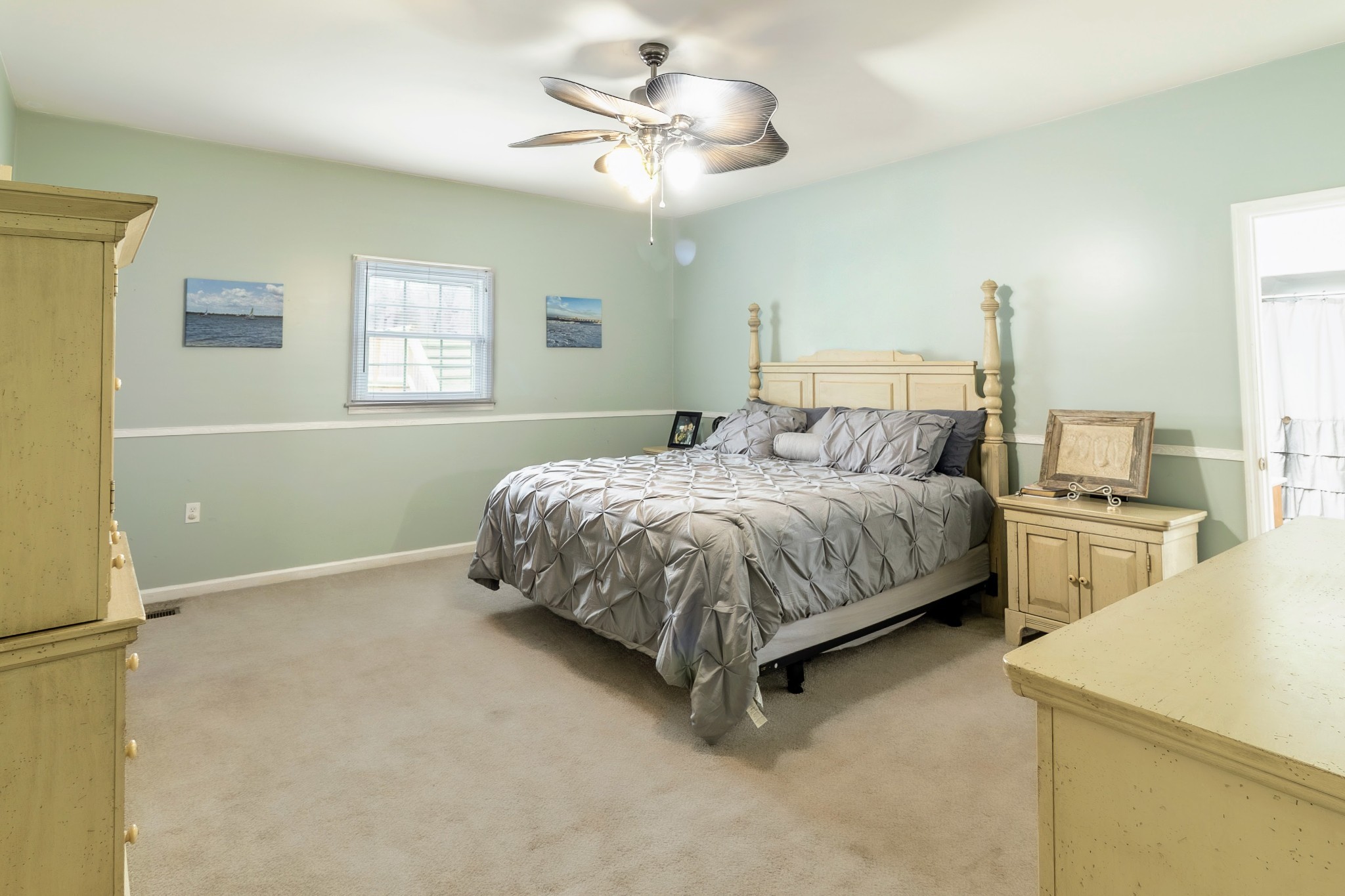1910 Cedar Creek Road Vanleer, TN 37181 - Photo 16 of 44 a bedroom with a bed chandelier and a window