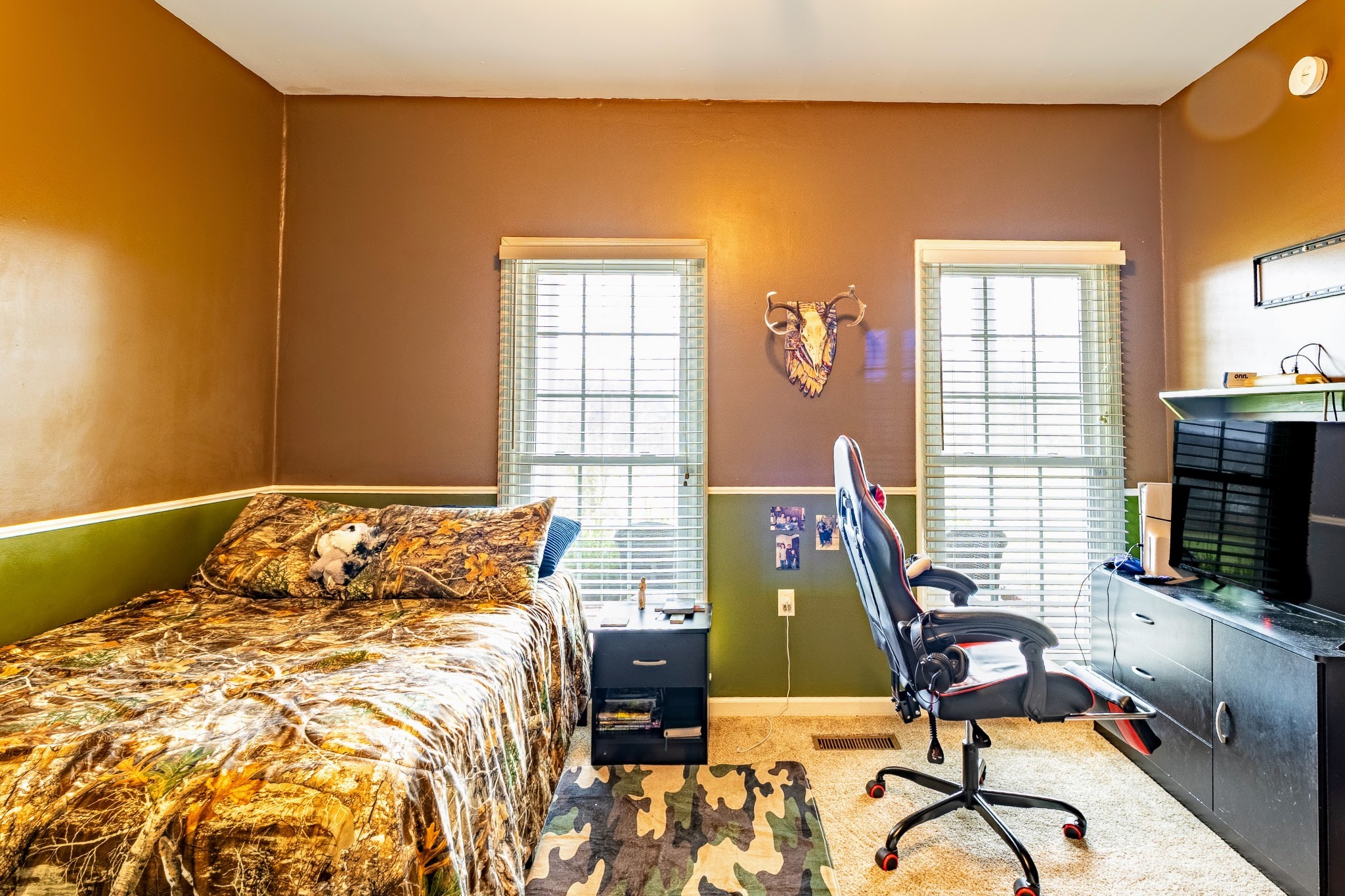 1910 Cedar Creek Road Vanleer, TN 37181 - Photo 20 of 44 a bed sitting in a bedroom next to a window