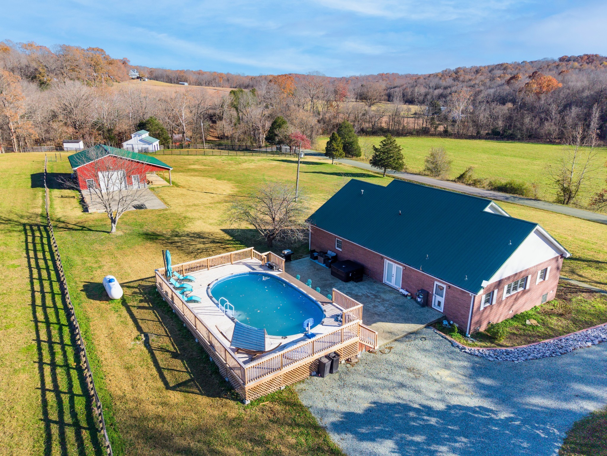 1910 Cedar Creek Road Vanleer, TN 37181 - Photo 2 of 44 an aerial view of a house with a swimming pool