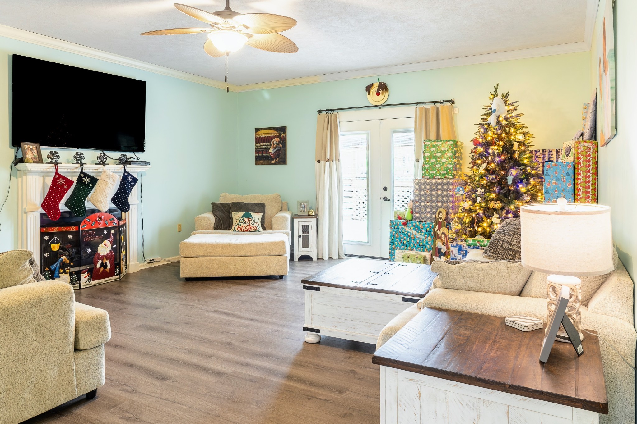1910 Cedar Creek Road Vanleer, TN 37181 - Photo 10 of 44 a living room with furniture and a flat screen tv