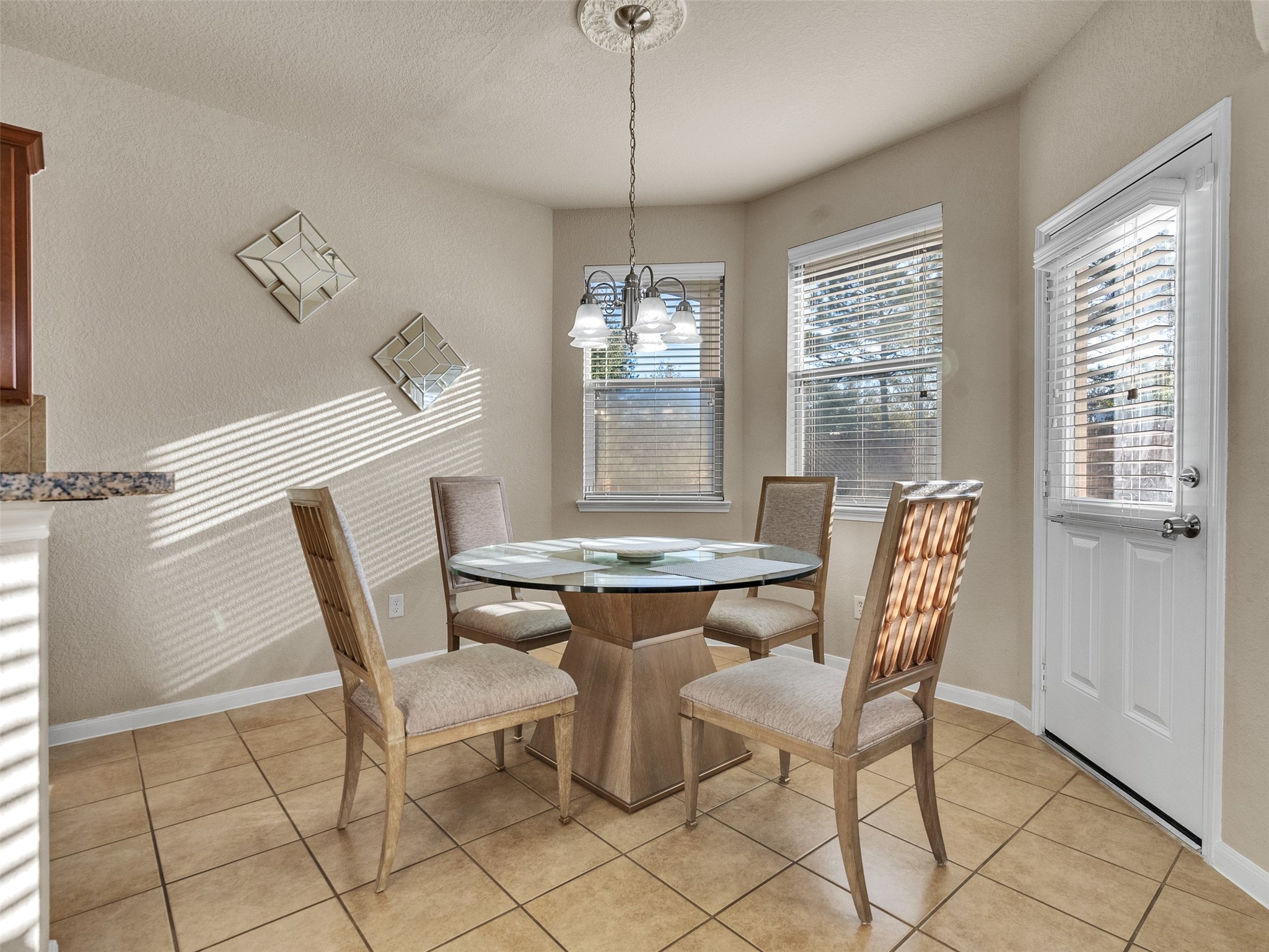 522 Summer Mist Lane Rosenberg, TX 77469 - Photo 13 of 36 This sun-drenched breakfast nook offers a cozy and elegant space for casual dining, perfectly positioned between the kitchen and the home's natural light