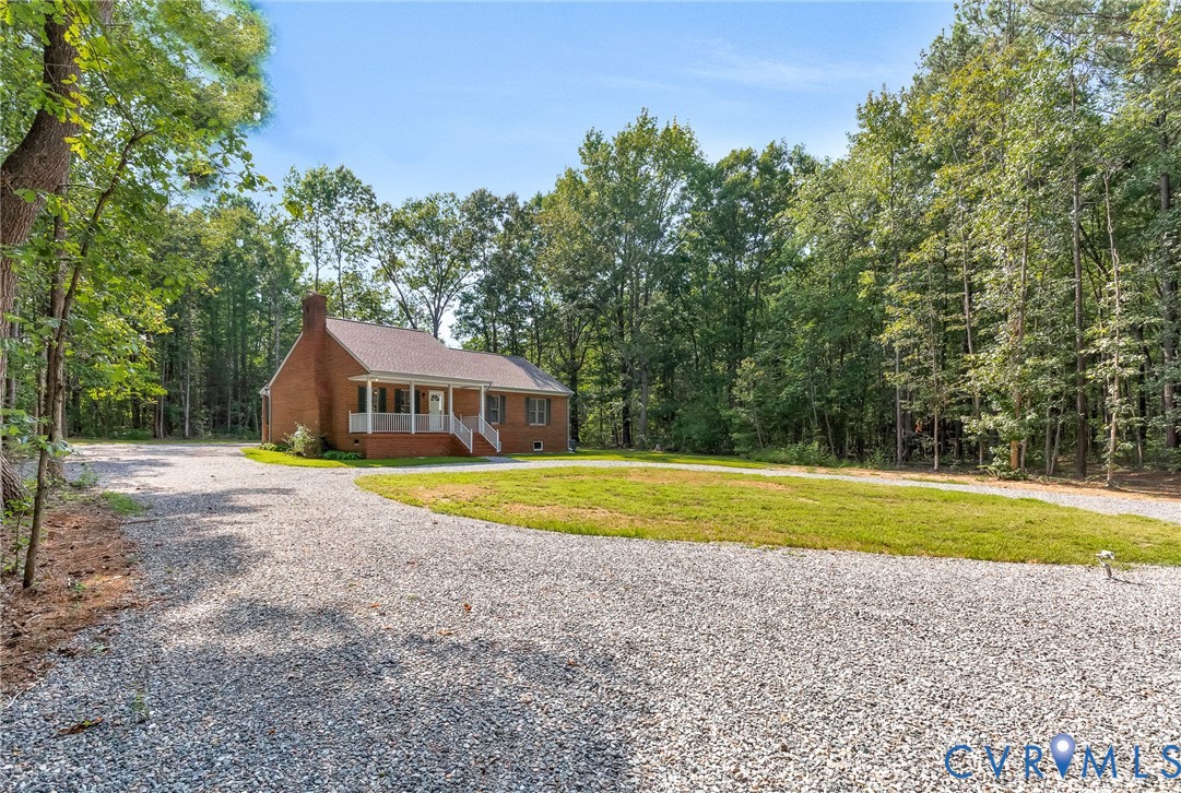 15321 Goshen Road Montpelier, VA 23192 - Photo 3 of 36 Brick exterior residence with a covered front porc