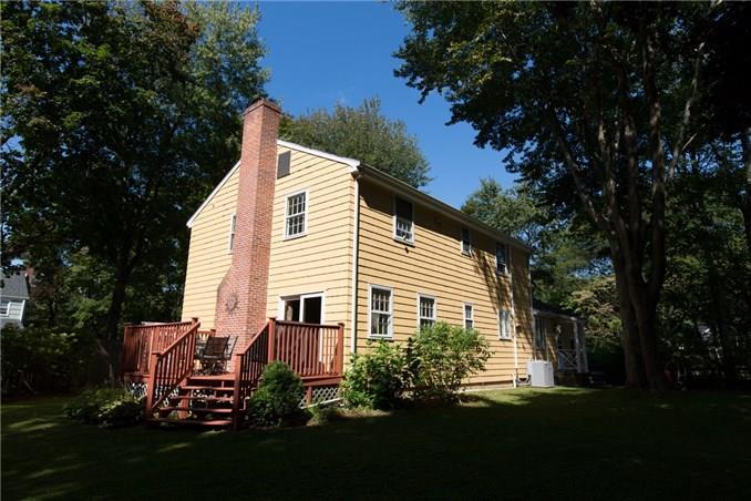 1104 Mill Plain Road Fairfield, CT 06824 - Photo 1 of 1 a view of a house with backyard and garden