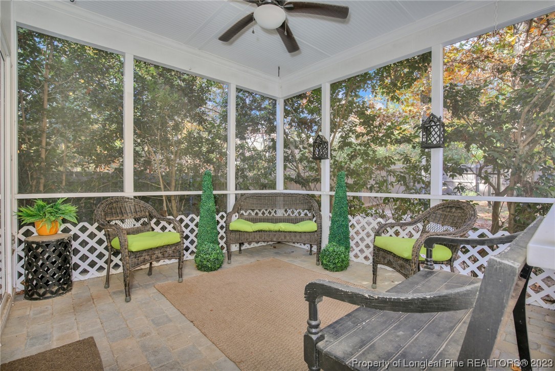 1145 Burning Tree Road Pinehurst, NC 28374 - Photo 33 of 45 a view of a chairs and table in the patio