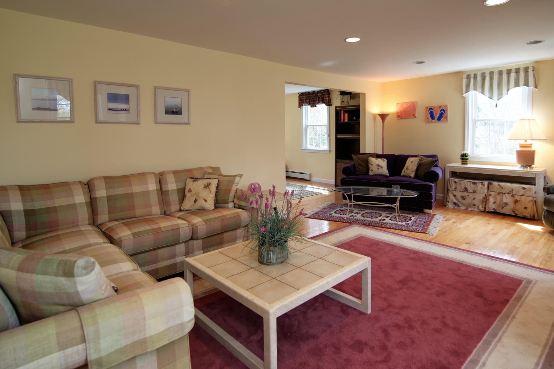 115 Holly Point Road Centerville, MA 02632 - Photo 14 of 26 a living room with furniture and wooden floor