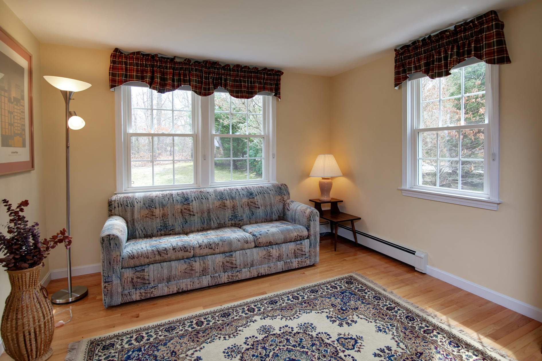 115 Holly Point Road Centerville, MA 02632 - Photo 15 of 26 a living room with furniture and a window