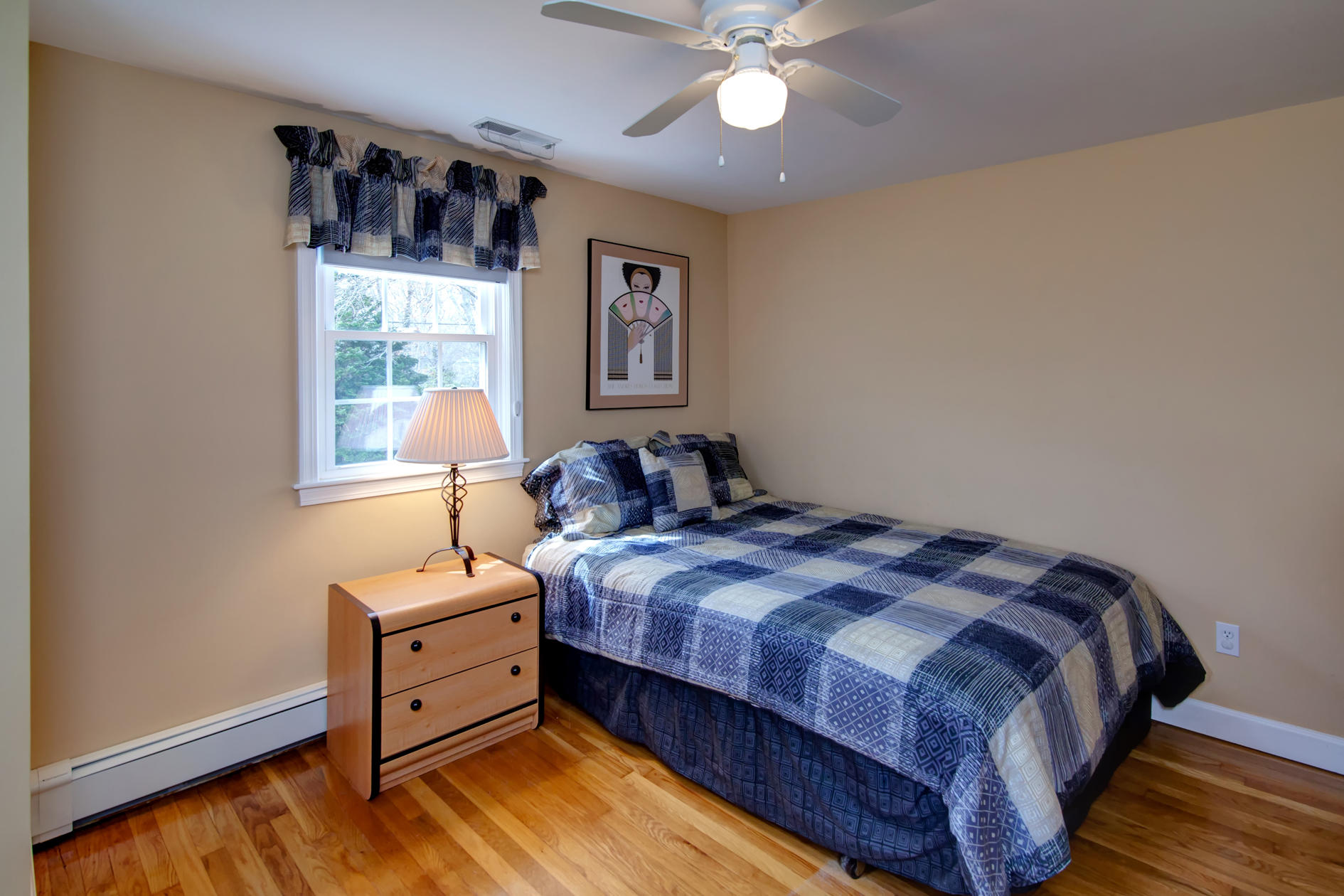 115 Holly Point Road Centerville, MA 02632 - Photo 23 of 26 a bedroom with a bed and a window