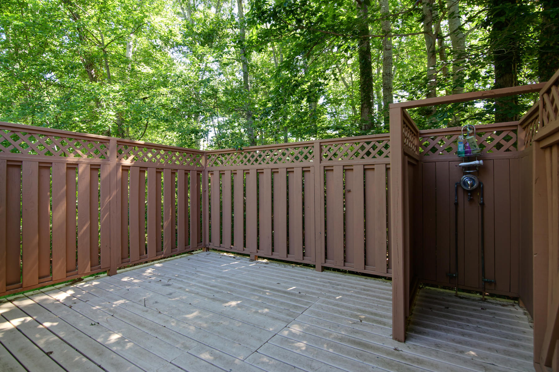 115 Holly Point Road Centerville, MA 02632 - Photo 8 of 26 a view of a wooden fence