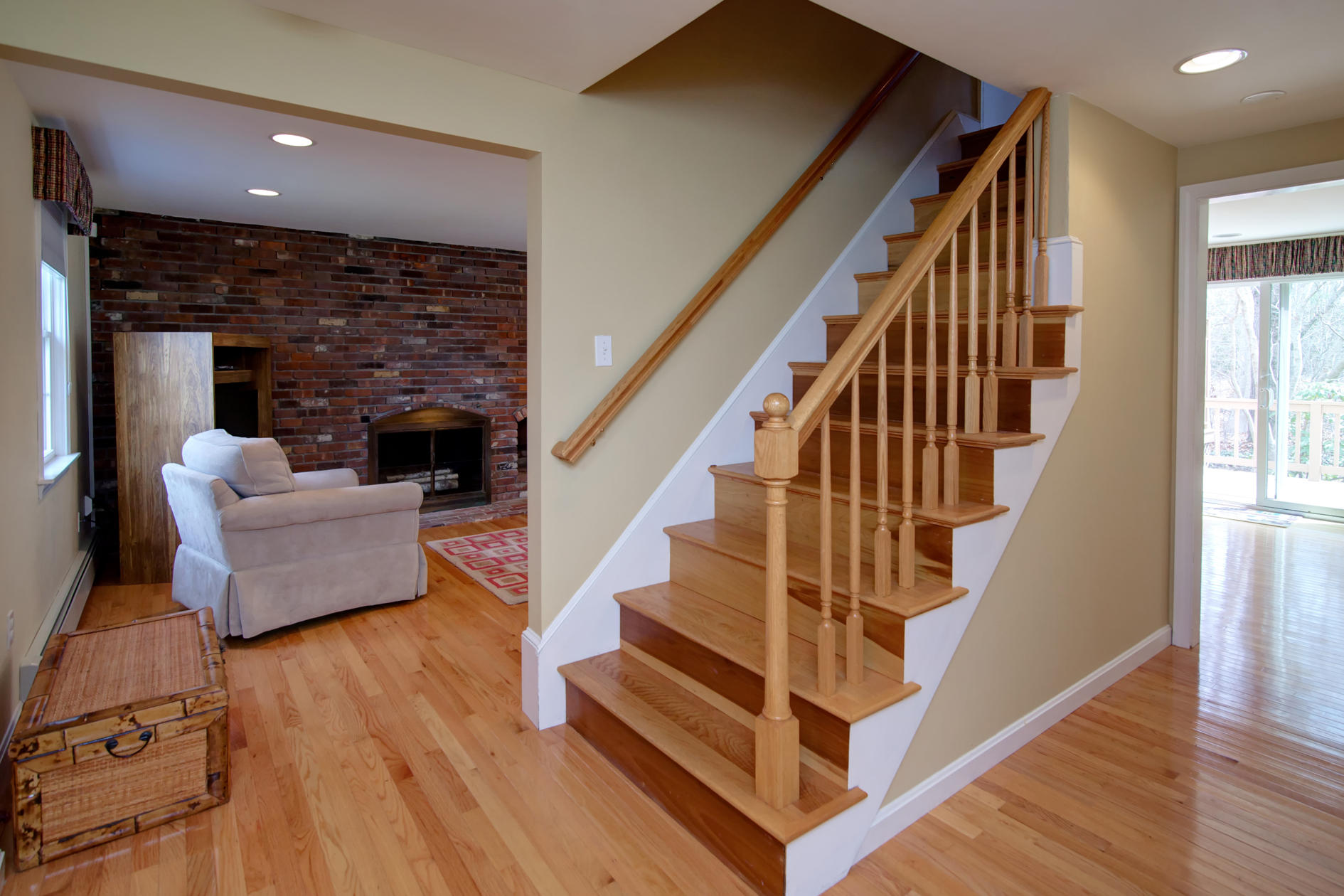 115 Holly Point Road Centerville, MA 02632 - Photo 10 of 26 a living room with wooden floor and furniture