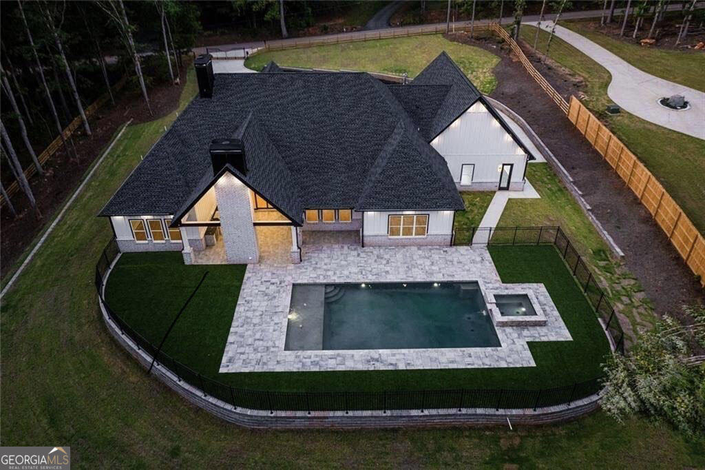 1622 Double Springs Monroe, GA 30656 - Photo 2 of 44 an aerial view of a house with swimming pool patio and outdoor seating