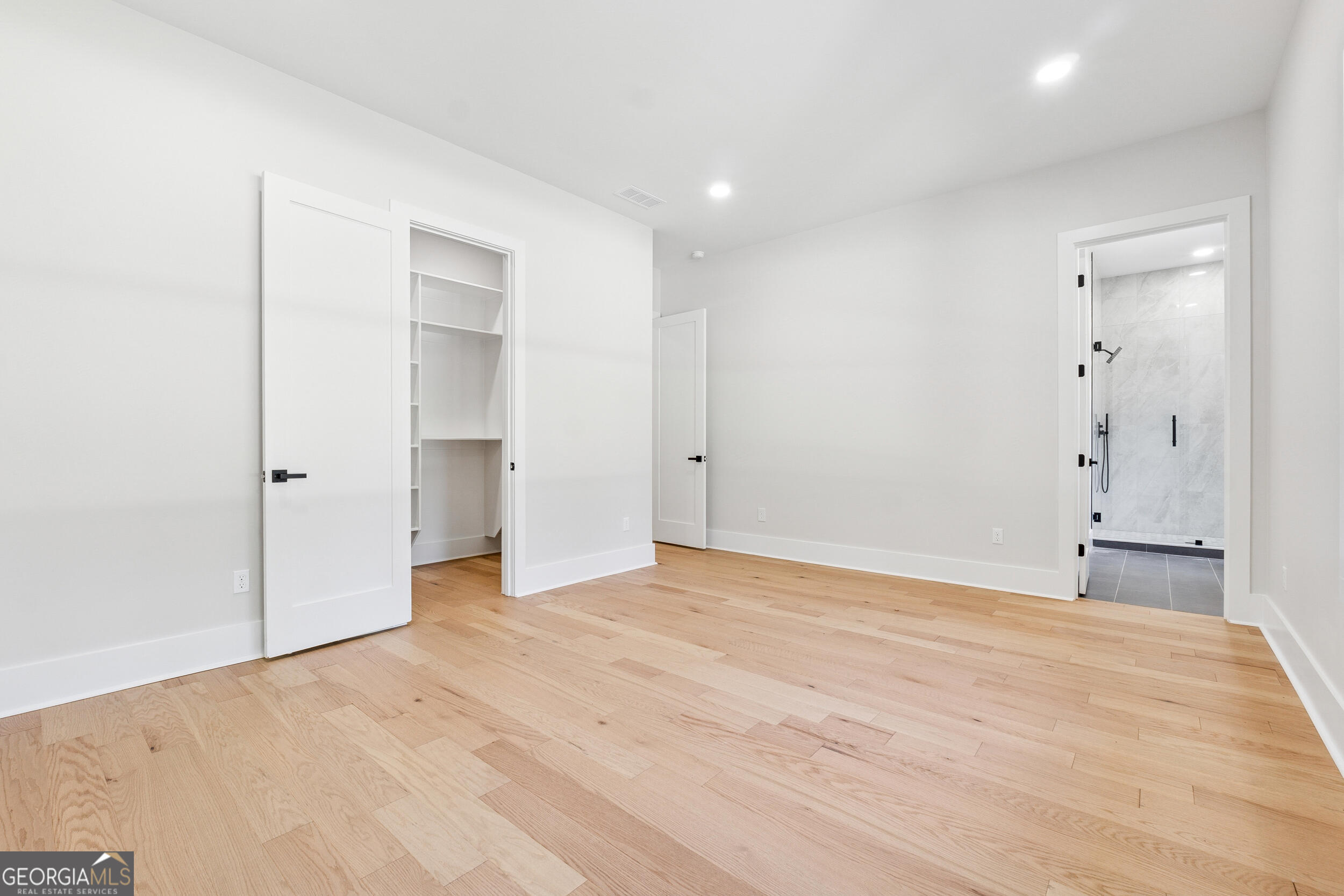 1622 Double Springs Monroe, GA 30656 - Photo 29 of 44 a view of empty room with wooden floor