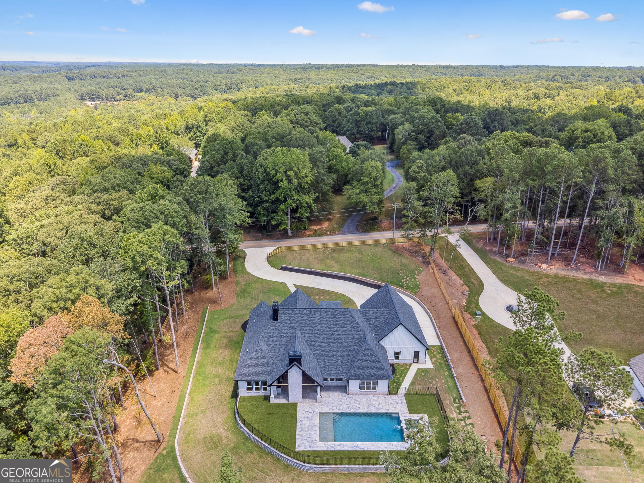 1622 Double Springs Monroe, GA 30656 - Photo 41 of 44 an aerial view of a house with swimming pool and lake view