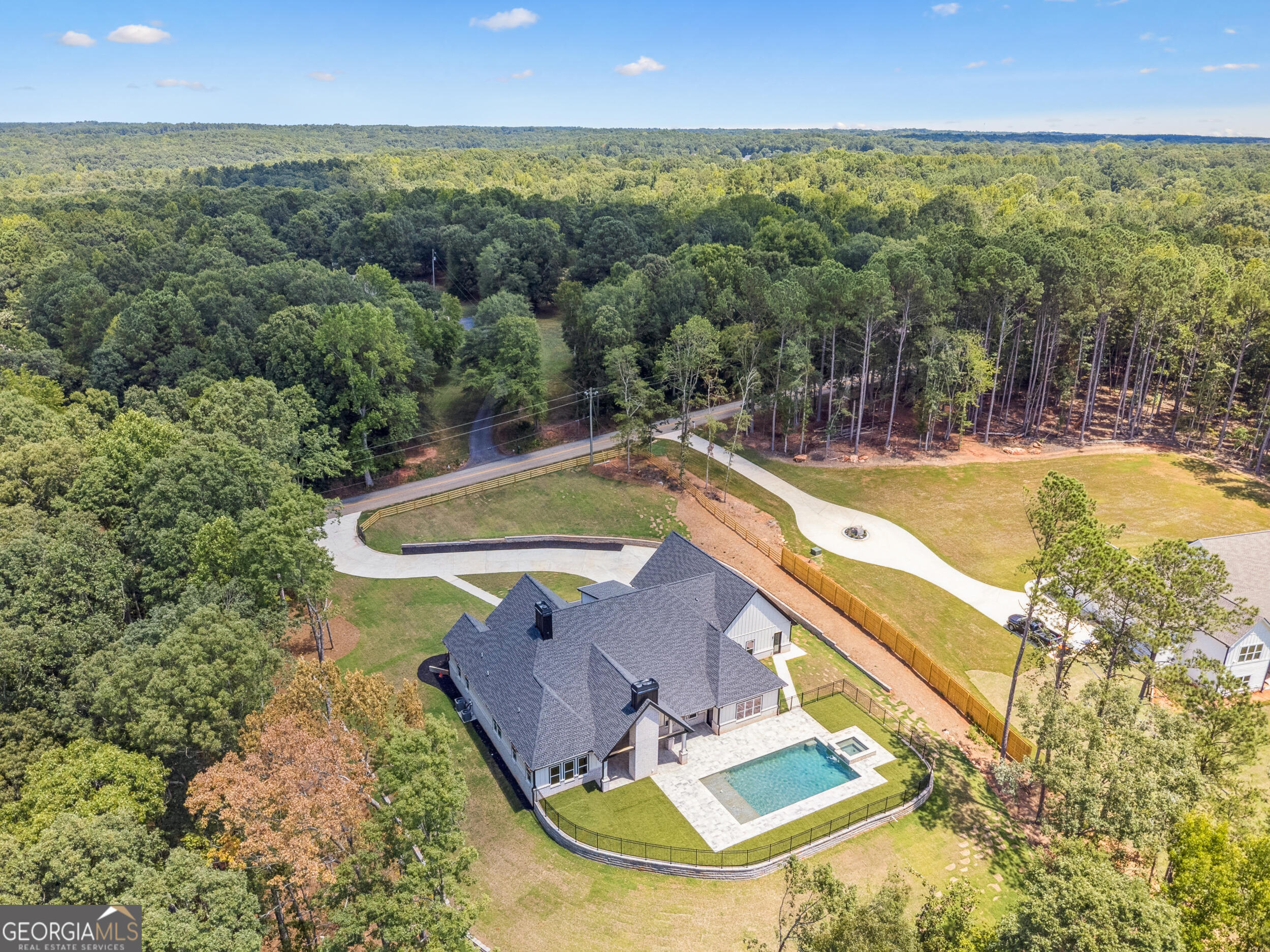 1622 Double Springs Monroe, GA 30656 - Photo 44 of 44 a view of a swimming pool with a yard and mountain view