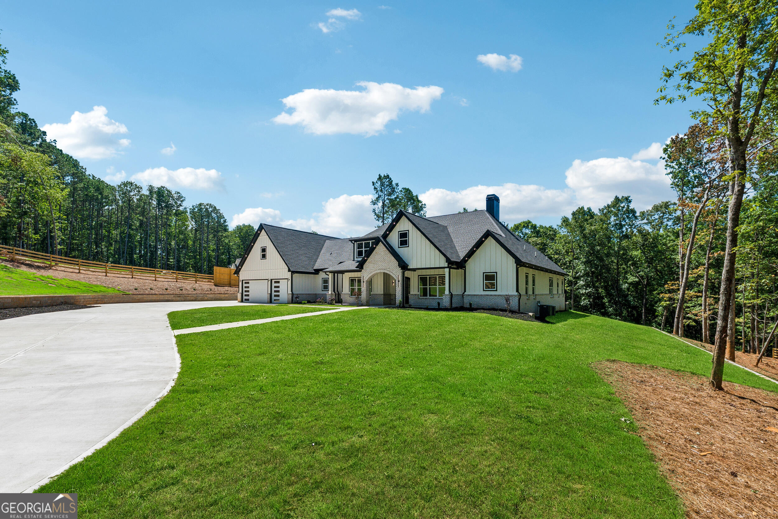 1622 Double Springs Monroe, GA 30656 - Photo 5 of 44 a view of a house with a big yard and potted plants