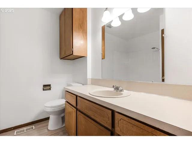 a view of balcony with wooden floor