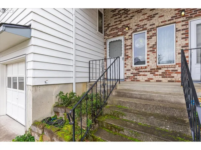 a view of a livingroom with furniture window and wooden floor