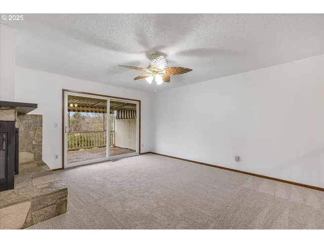 a kitchen with a sink stove and microwave