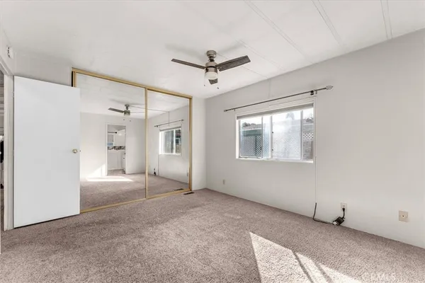 a bathroom with a toilet and a vanity