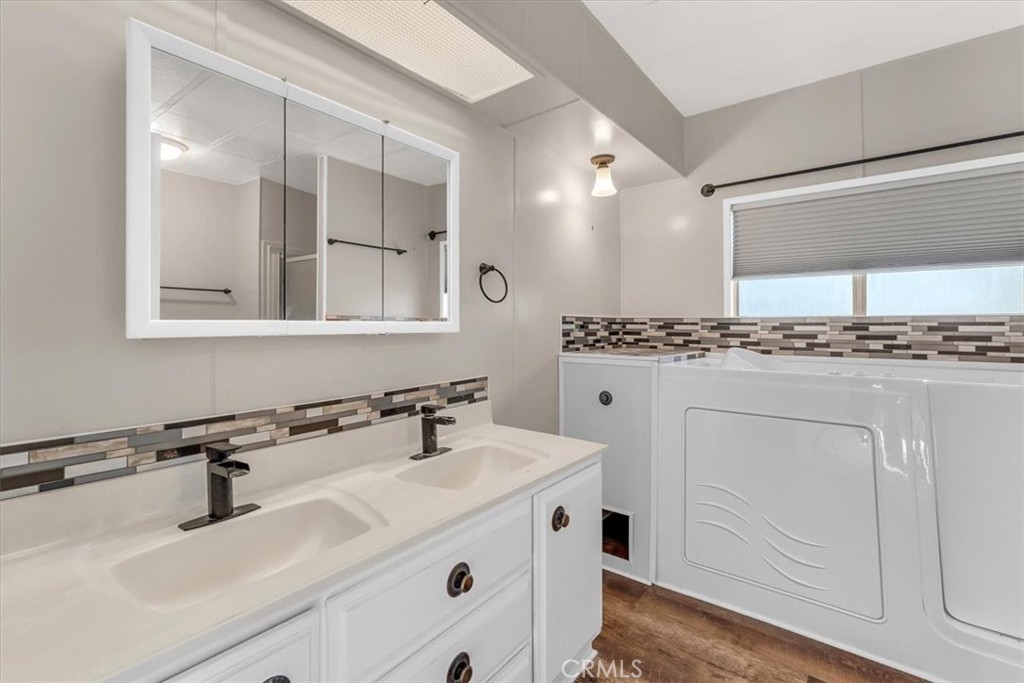 350 Gilmore Road, Unit 16 Red Bluff, CA 96080 - Photo 23 of 35 a bathroom with a sink and a mirror