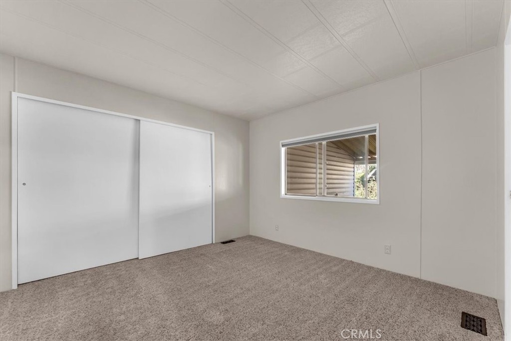 350 Gilmore Road, Unit 16 Red Bluff, CA 96080 - Photo 26 of 35 a view of an empty room with a window