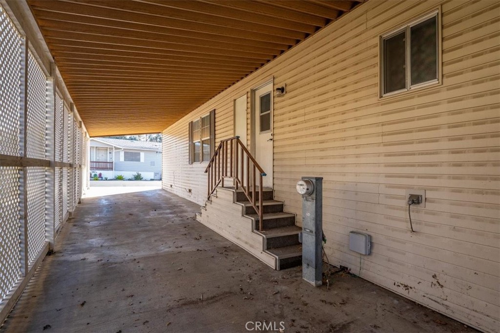 350 Gilmore Road, Unit 16 Red Bluff, CA 96080 - Photo 32 of 35 a view of a porch with wooden stairs