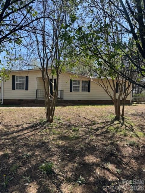 3876 Will Proctor Street Denver, NC 28037 - Photo 2 of 14 a house with a tree in front of it