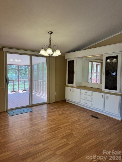 3876 Will Proctor Street Denver, NC 28037 - Photo 3 of 14 a view of an empty room with window and wooden floor