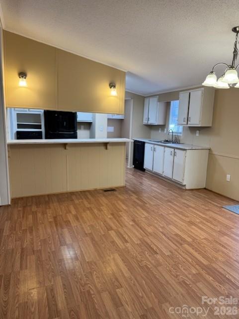 3876 Will Proctor Street Denver, NC 28037 - Photo 6 of 14 a view of kitchen with stainless steel appliances cabinets and wooden floor