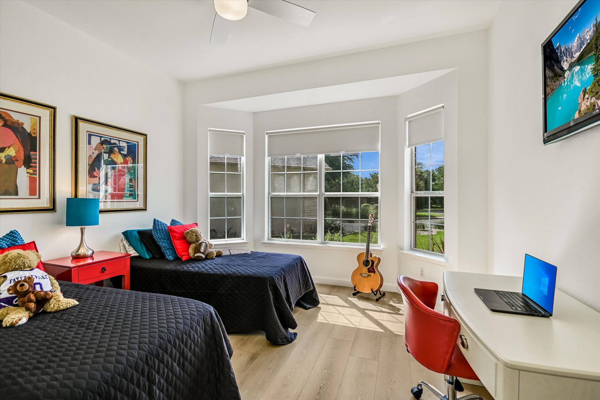 105 Stetson Circle Georgetown, TX 78633 - Photo 14 of 21 Spacious secondary bedroom located toward the front of the home with a large bay window.