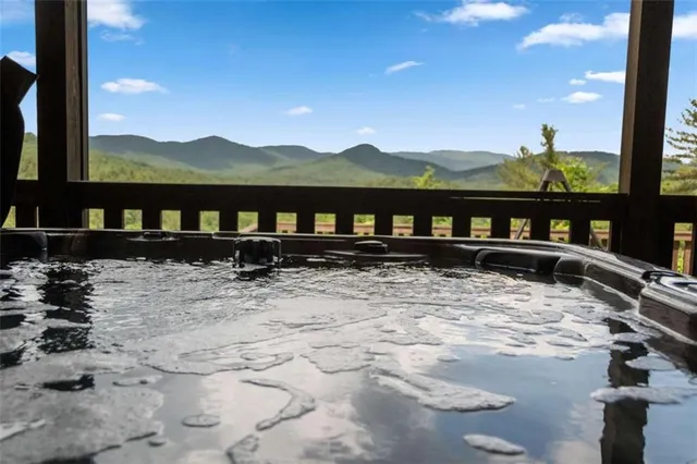 a view of a chairs and table in the patio