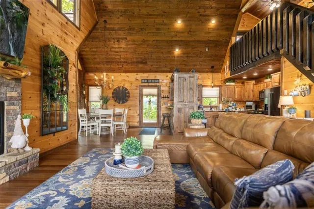 a kitchen with refrigerator and cabinets