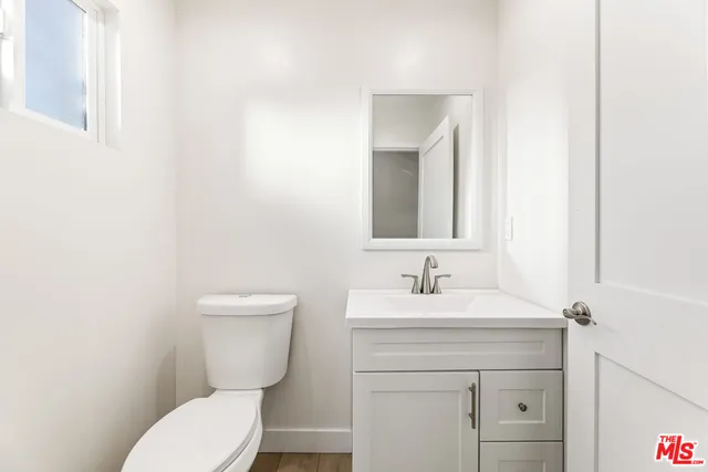 a view of a hallway with washer and dryer