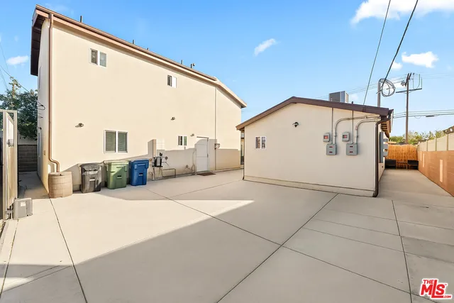 a view of an empty room with windows