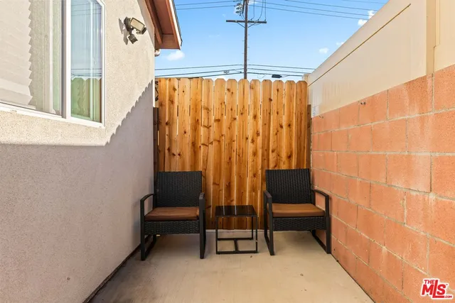 a view of a kitchen with a washer and dryer