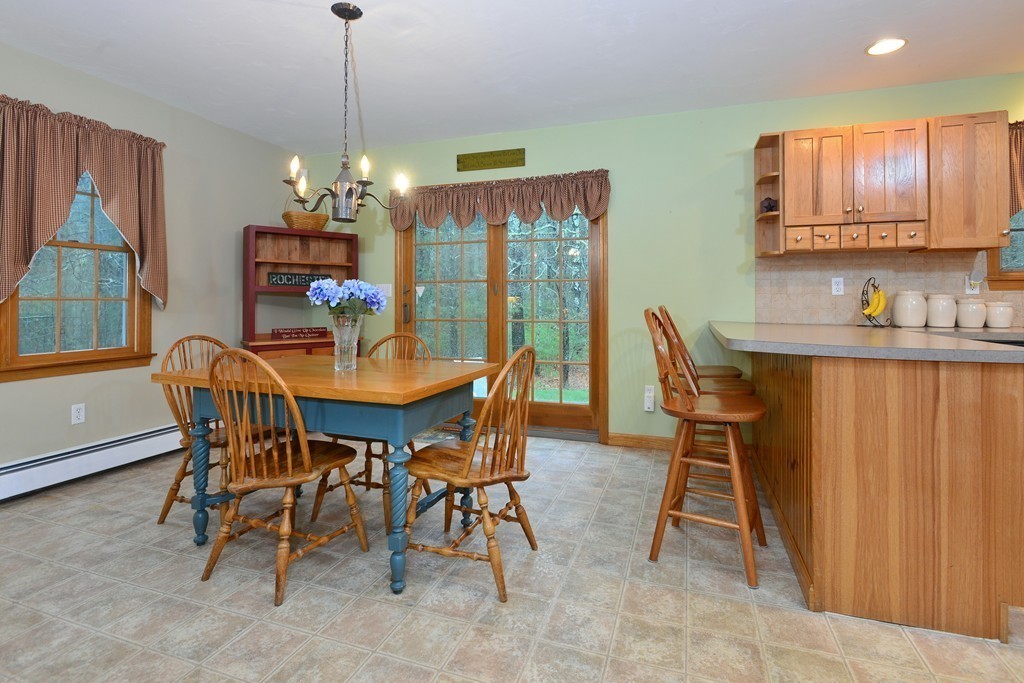 86 Haskell Ridge Road Rochester, MA 02770 - Photo 6 of 25 a view of a dining room with furniture window and outside view