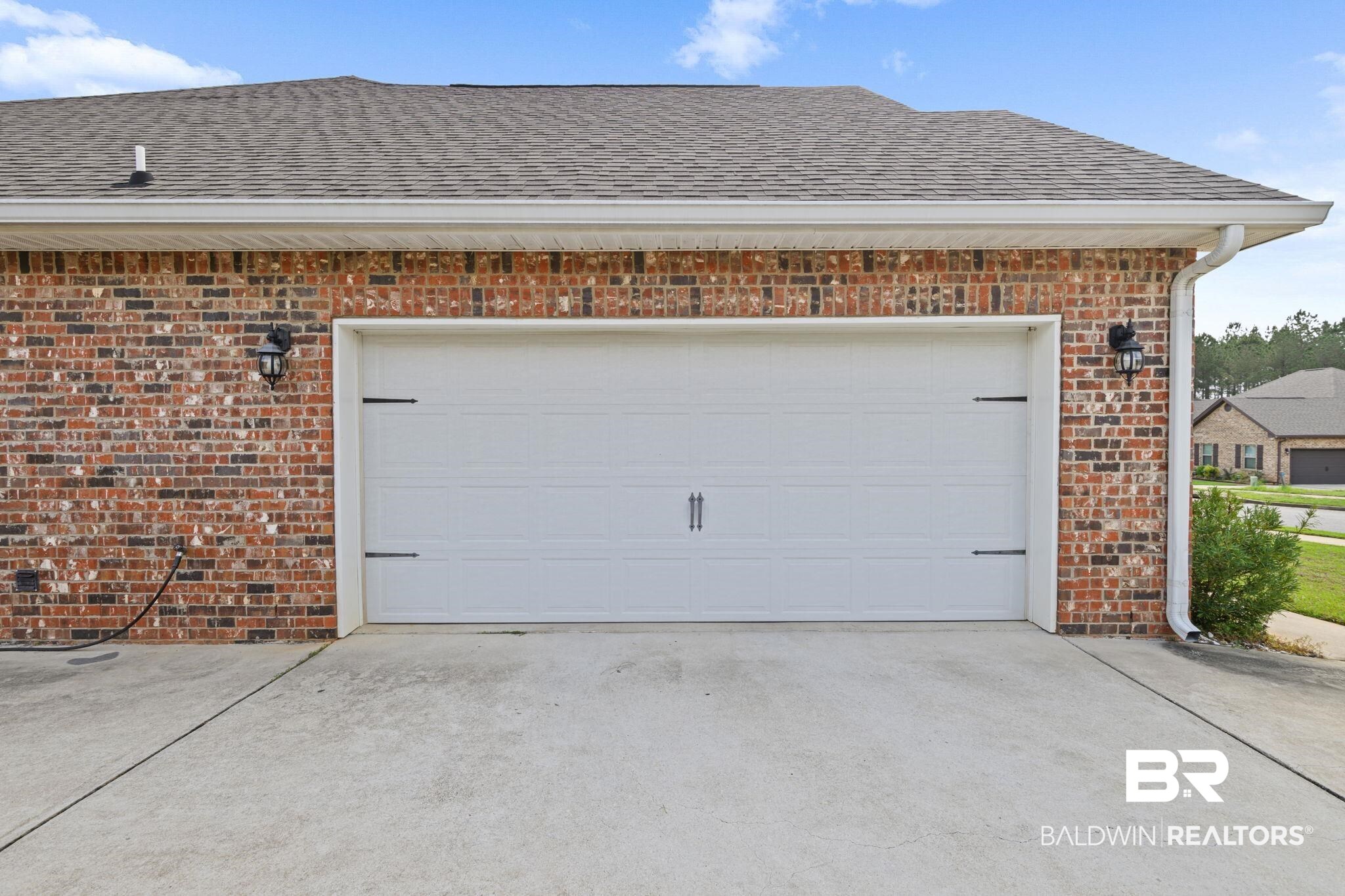 12693 Waxwing Avenue Daphne, AL 36527 - Photo 7 of 43 Garage with driveway